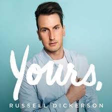 Portrait of Russell Dickerson against turquoise background with Yours text overlay, album cover