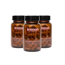 Three brown glass bottles of Jemrah supplement product with black caps arranged in a row